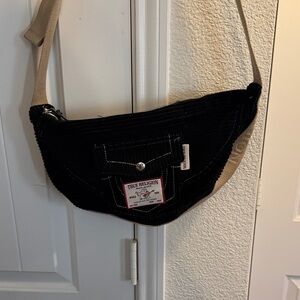 True Religion Black Hobo Bag with Tan Strap